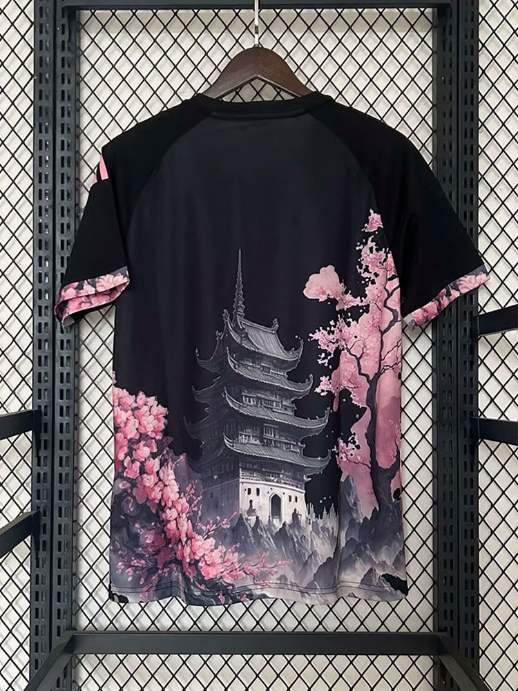 Dos du maillot du Japon 2024 noir avec un dragon noir et rose 